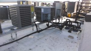 Secure and Elevated Rooftop unit. Ready for the stormy season.